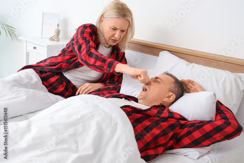 Displeased mature woman cov...