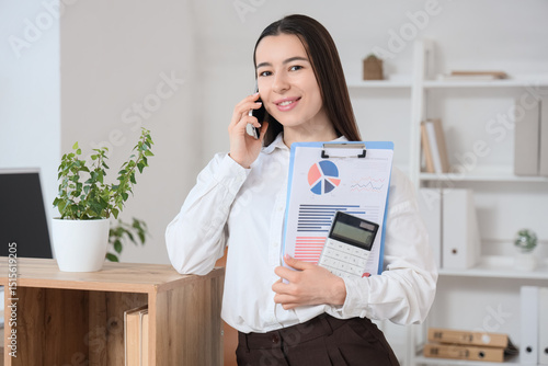 Smiling young businesswoman...