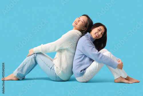 Beautiful young happy Asian...