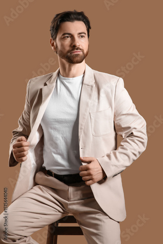 Handsome young man in light...
