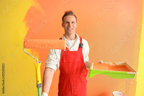 Male decorator with paint r...