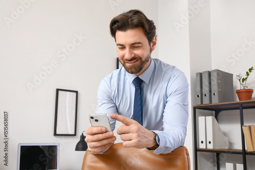 Handsome businessman workin...