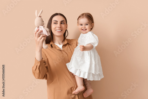 Mother with her baby and to...