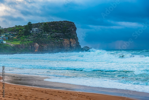 Photography Moody sunrise with waves at the seaside