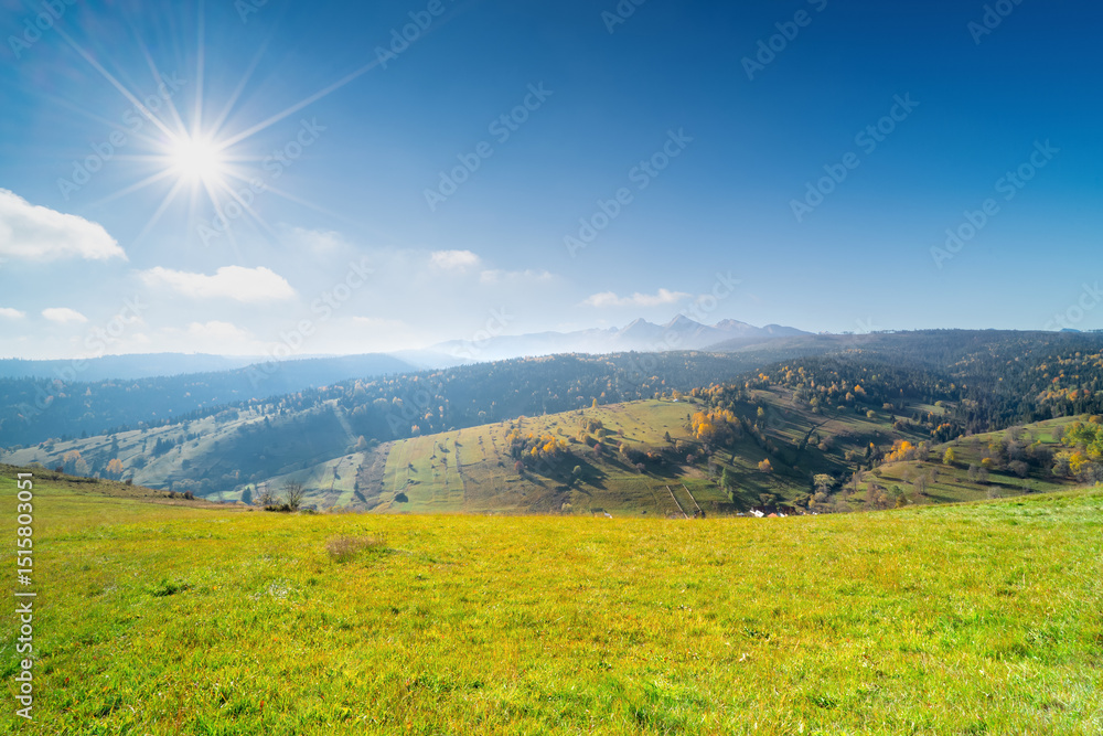 Meadow landscape with sun and view of the Tatra Mountains, Osturňa, Slovakia. Meadow landscape with sun and view of the Tatra Mountains, Osturňa, Slovakia.