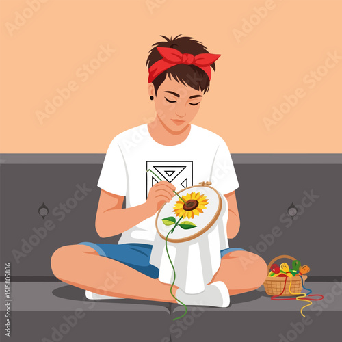 Person Embroidering Sunflower Design on Fabric Sitting Comfortably at Home