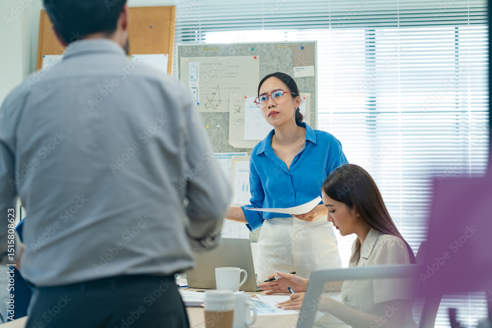 Fototapeta premium Investment Consultant,strategy,planning,Financial advisor and accounting concept.Group of business adviser meeting to analyze and discuss the situation on the financial report workplace office.