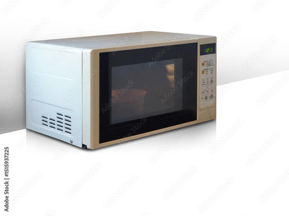 side view old white and black microwave oven placed on white floor, white wall background, technology, object, ferniture, copy space side view old white and black microwave oven placed on white floor, white wall background, technology, object, ferniture, copy space