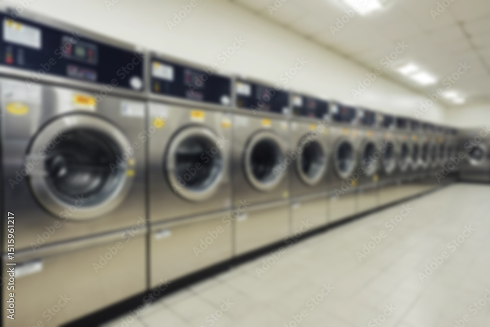 Obraz premium general washing machine blur, washing machine and clothes dryer neatly lined up, without any people, laundry background blurry.