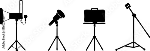 Professional Photography Studio Setup with Tripods, Lights, Camera & Media Equipment