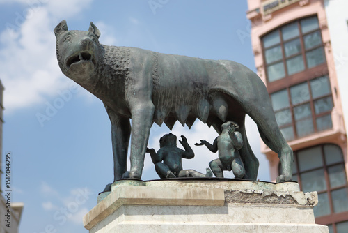 Replica of the Capitoline Wolf , a bronze sculpture of a she-wolf suckling twin human infants inspired by the legend of the founding of Rome