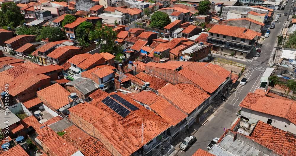 Favela Rooftops Dense favela with red tiled rooftops and narrow streets in Sao Luis ...