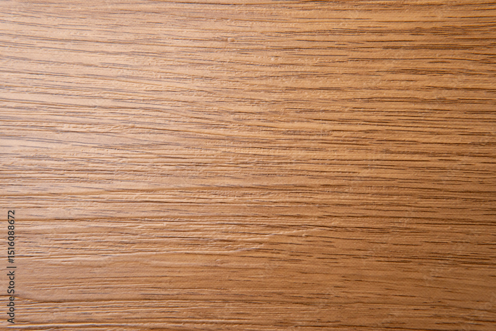 Top-down view of a light brown wooden surface, showcasing its natural grain patterns with horizontal lines and subtle variations in tone. Top-down view of a light brown wooden surface, showcasing its natural grain patterns with horizontal lines and subtle variations in tone.