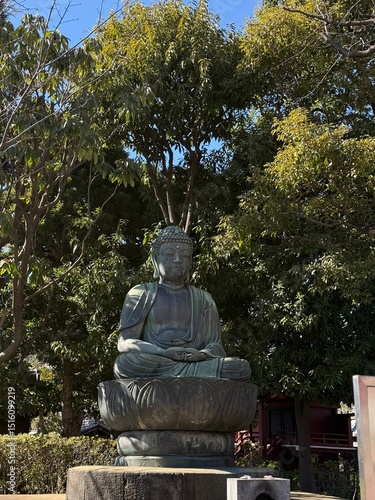 Photography statue in the park tokyo buddha