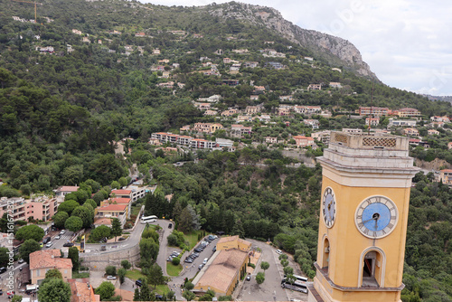 A stunning view of Eze, a medieval hilltop village in the South of France with stone buildings, gardens, and panoramic Mediterranean views.