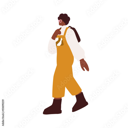 Black woman walking outdoors. Young modern urban style African-American femal...