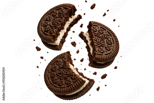 Three oreo cookies crumbling in air isolated on transparent background