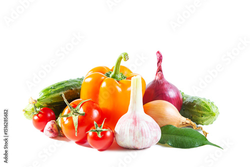 Mix of colorful vegetables - bell pepper, tomatoes, cucumbers, onions and garlic.
