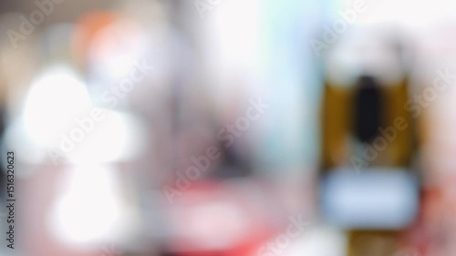 Wallpaper Mural Woman is holding a cell phone and taking a picture. The image is blurry and the woman's face is not clearly visible Torontodigital.ca