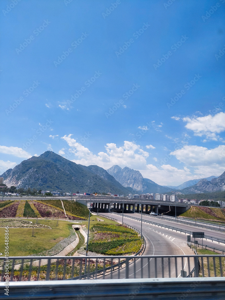 Naklejka premium Modern Highway Winding Through Mountainous Landscape in Antalya