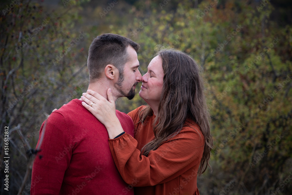 happy young couple posing outdoors in autumn happy young couple posing outdoors in autumn