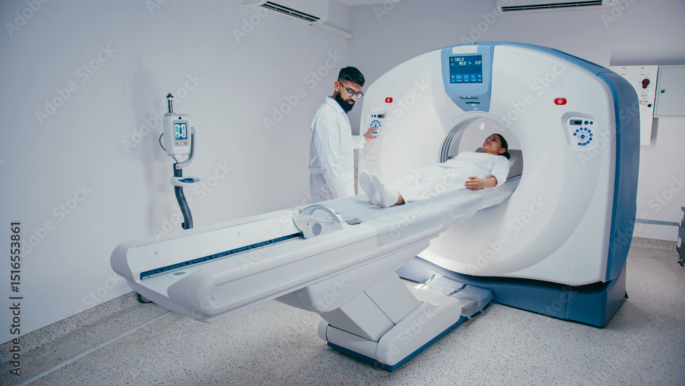Focused technician monitoring panel while calm female patient slowly sliding out of MRI scanner. Conducting final stage of medical imaging process inside high-tech examination room. Focused technician monitoring panel while calm female patient slowly sliding out of MRI scanner. Conducting final stage of medical imaging process inside high-tech examination room.