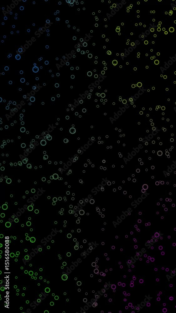 Abstract flying colorful bubbles on black background. small bubbles float straight up fast.