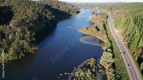Drone View of River and Road through Dense Forest in Southern Chile
