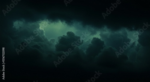 Black green blue night sky with clouds. Dark dramatic skies background for design. Cloudy, rainy, windy, stormy weather. Or a frightening, spooky, creepy, nightmare concept