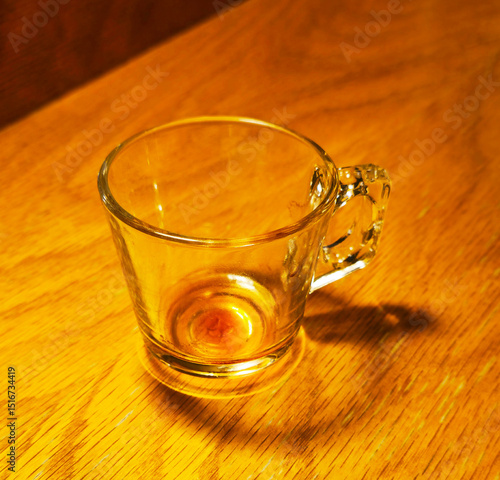 glass dirty cup on wooden table background