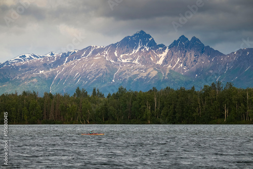 Photography Sun on mountains behind Lake Lucille in Alaska