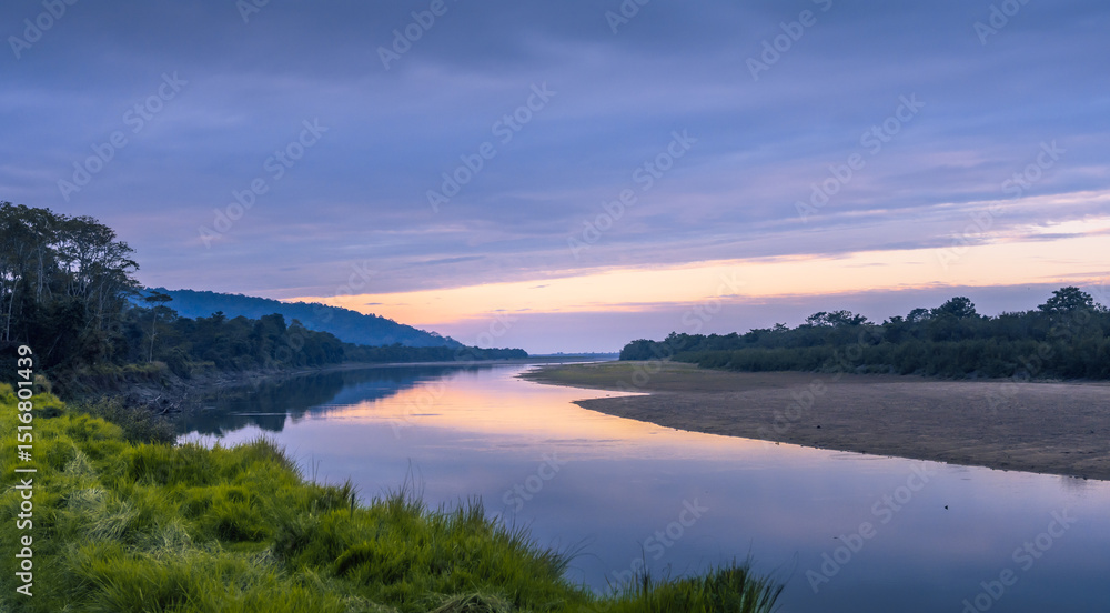 Stunning sunset view of the riven Brahmaputra in Kaziranga national park, Assam, India Stunning sunset view of the riven Brahmaputra in Kaziranga national park, Assam, India