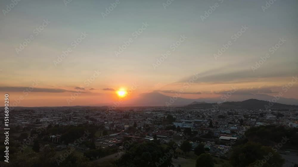 Sunset over the exploding Popocatpetl volcano, time lapse Sunset over the exploding Popocatpetl volcano, time lapse