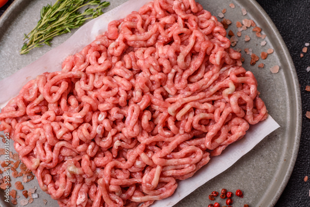 Raw ground beef or pork as an ingredient for burgers. Raw minced meat Raw ground beef or pork as an ingredient for burgers. Raw minced meat