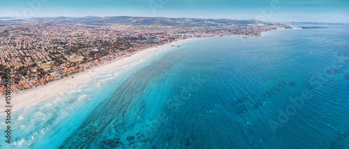 Fototapeta Naklejka Na Ścianę i Meble -  Stunning aerial view of Ilica beach, Turkiye, showcasing the beautiful coastline, crystal clear turquoise water, perfect for summer vacation