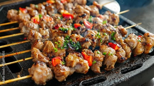 Juicy grilled skewers with smoky bbq flavor and vibrant vegetables sizzling over an open flame
