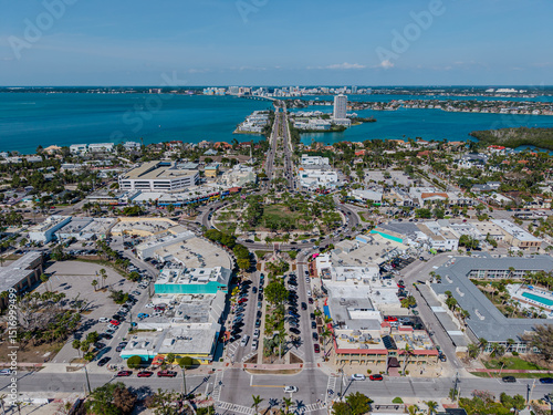 Beautiful aerial view of Sarasota, the magnificent white sand beach, and its iconic St. Armands Circle