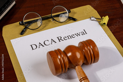 Photography DACA Renewal Document with Gavel and Pen – Immigration Policy and Legal Protecti