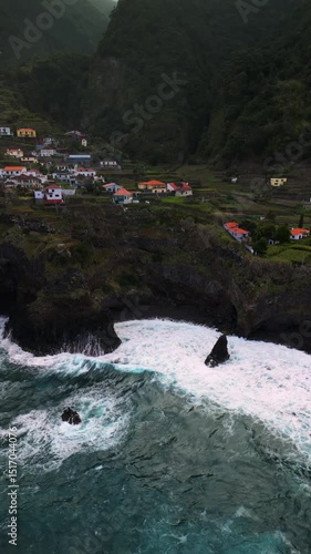 Cinematic Drone View of Coastal Town on Rocky Cliffs – Madeira Island