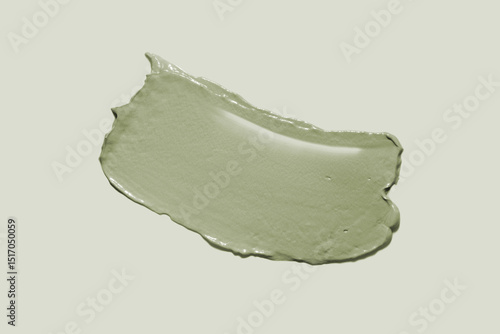 Obraz na płótnie Cosmetic green mask texture smudge isolated on green background