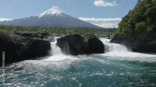 River Rapids Through Forest and Volcanic Rocks in Chile Petrohue Waterfalls