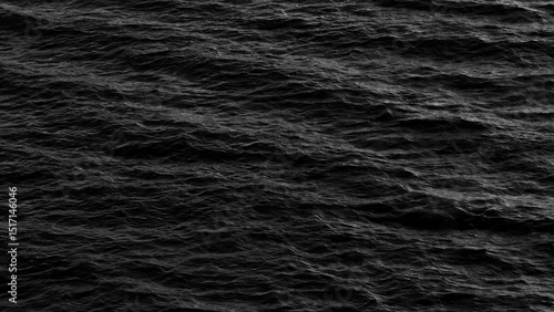 A captivating black and white image of sea waves in motion, where the dynamic flow of the water creates a powerful visual, showcasing the raw energy and beauty of the ocean's movement.

