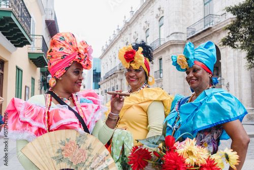 Photos Cuban women called canasteras with habano flowers and typical costume in La Hava