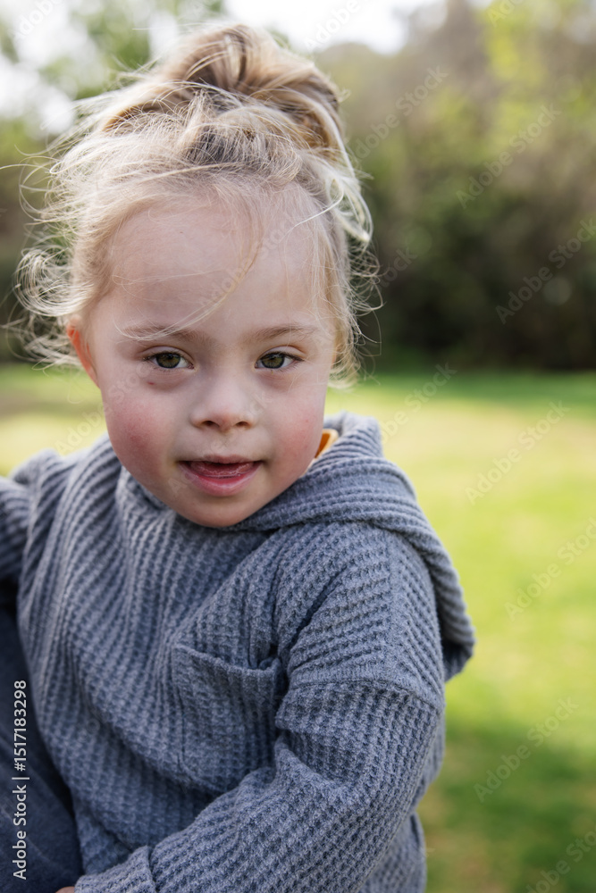 Young Child Outdoors in a Relaxed Setting in Nature Young Child Outdoors in a Relaxed Setting in Nature