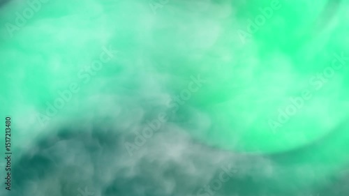 Smooth, abstract motion background featuring soft, billowing mint green smoke or fog. Creates a serene and mysterious atmosphere, perfect for intros, presentations, or artistic content.
