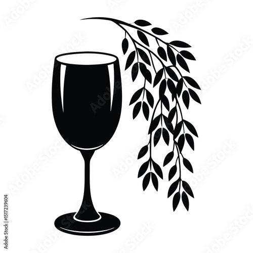 Elegant black glass filled with wine, adorned with a delicate vine and willow silhouette—capturing a blend of nature’s grace and refined sophistication in one scene.
