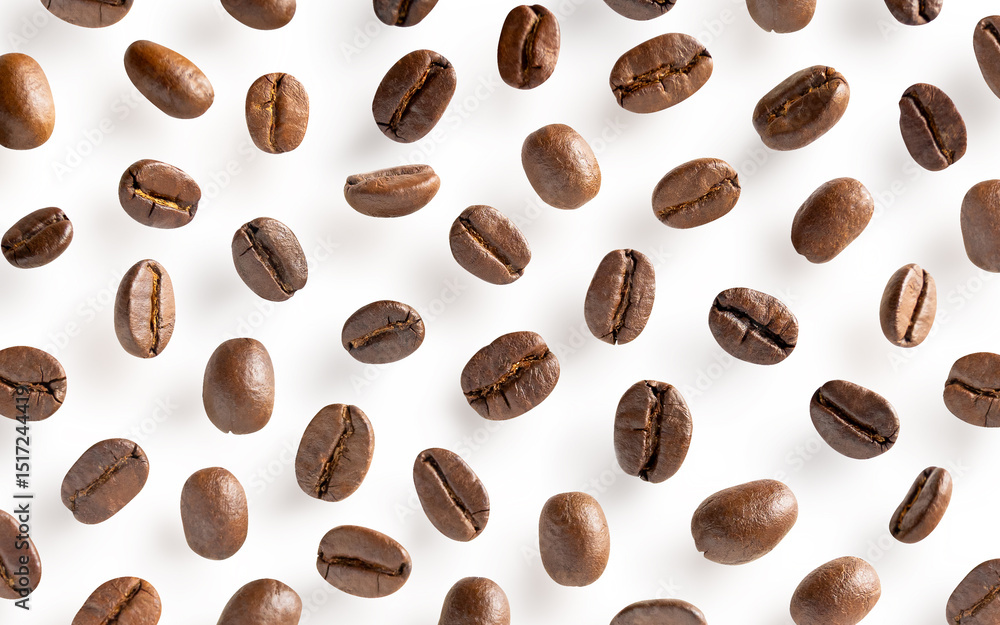 Roasted coffee beans. Scattered coffee beans on a white background with clipping paths. Close up. Roasted coffee beans. Scattered coffee beans on a white background with clipping paths. Close up.