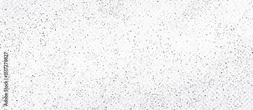 Black dust on transparent background. Rough grunge texture with scattered dark specks. Textured background with tiny black specks scattered around.