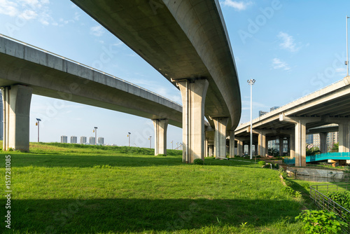 Concrete structure and asphalt road space under the overpass in the city