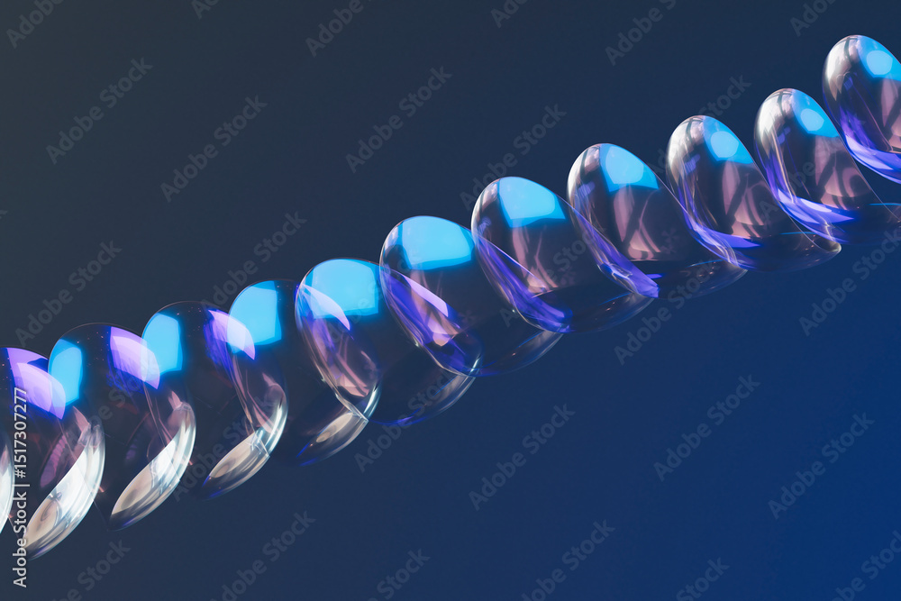 © Giada Canu/Stocksy - Geometric glowing spiral design in deep blue ambient light